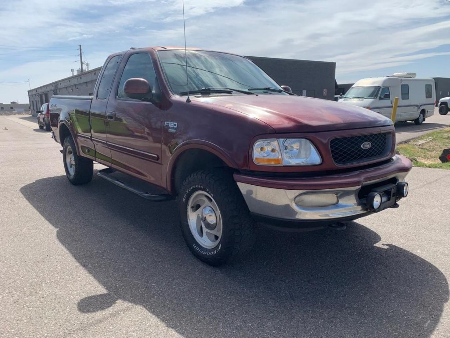 1998 Maroon FORD F150 (1FTZX18WXWK) with an 4.6L engine, Automatic transmission, located at 5972 Sheridan Blvd., Arvada, CO, 80003, (303) 422-4988, 39.805470, -105.053001 - Photo#0