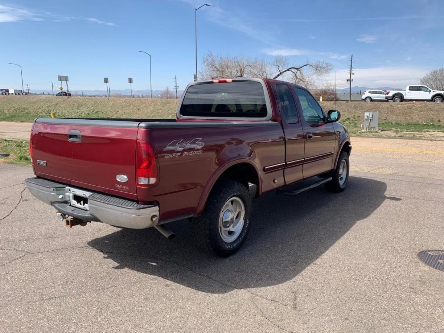 1998 Maroon FORD F150 (1FTZX18WXWK) with an 4.6L engine, Automatic transmission, located at 5972 Sheridan Blvd., Arvada, CO, 80003, (303) 422-4988, 39.805470, -105.053001 - Photo#1