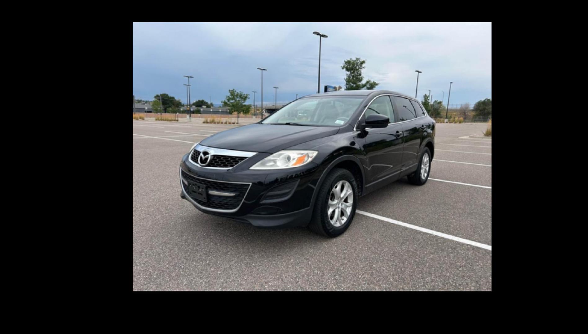 2011 Mazda CX-9 Touring (JM3TB2CAXB0) with an 3.7L V6 DOHC 24V engine, 6-Speed Automatic transmission, located at 5972 Sheridan Blvd., Arvada, CO, 80003, (303) 422-4988, 39.805470, -105.053001 - Wonderful car for the family. This vehicle's third row can accommodate 7 passengers or offer more trunk space when not in use. Drives great and runs great and is front wheel drive. The vehicles does have hail damage but runs and drives perfectly fine for a very nice smooth ride. - Photo#2