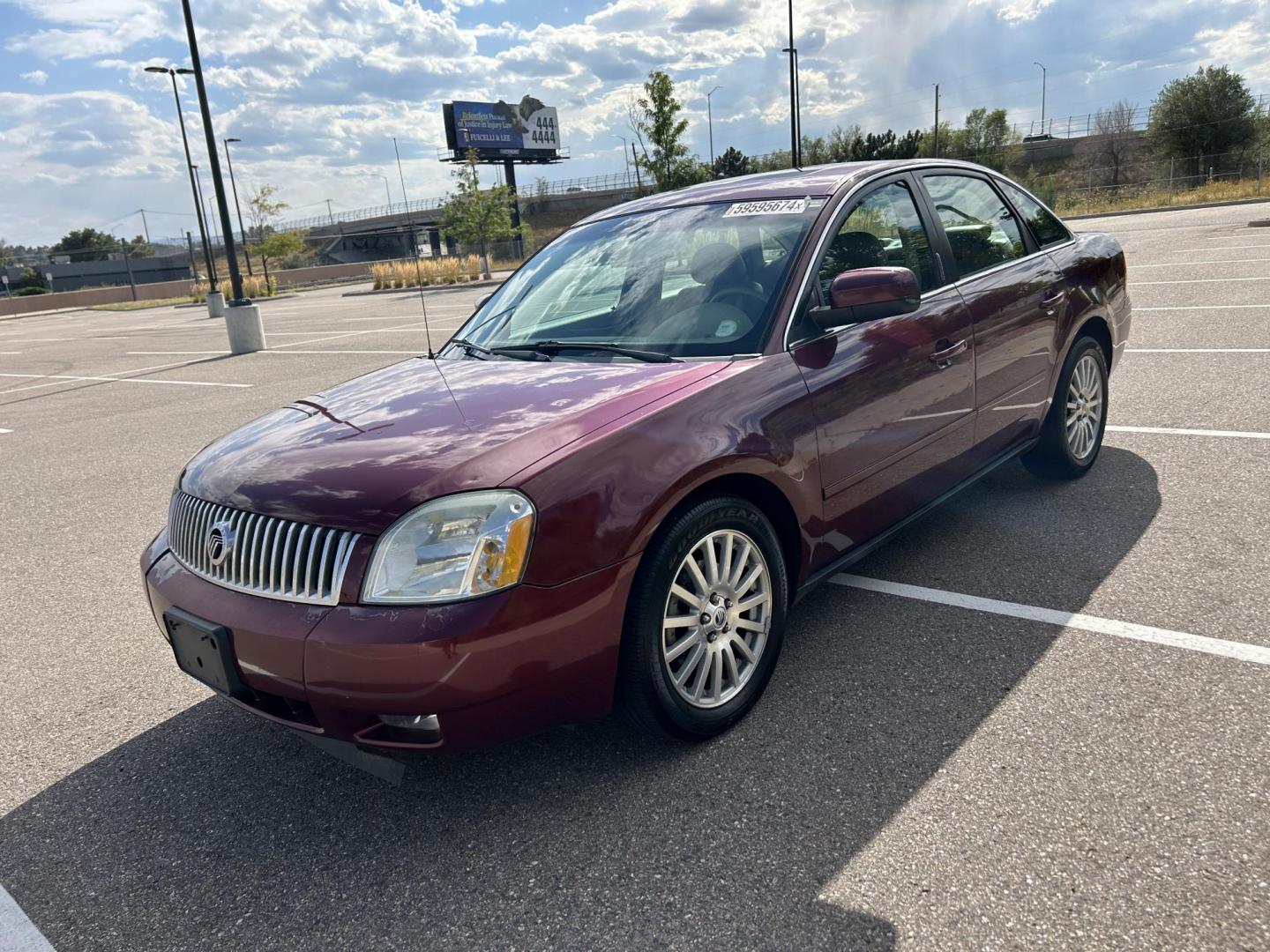 2005 Mercury Montego Premier (1MEFM421X5G) with an 3.0L V6 DOHC 24V engine, 6-Speed Automatic Overdrive transmission, located at 5972 Sheridan Blvd., Arvada, CO, 80003, (303) 422-4988, 39.805470, -105.053001 - Runs and drives great Leather seats Back up sensors Good tires Sunroof AC and heat work great Clean car Just got detailed Clean title Has hail damage - Photo#0