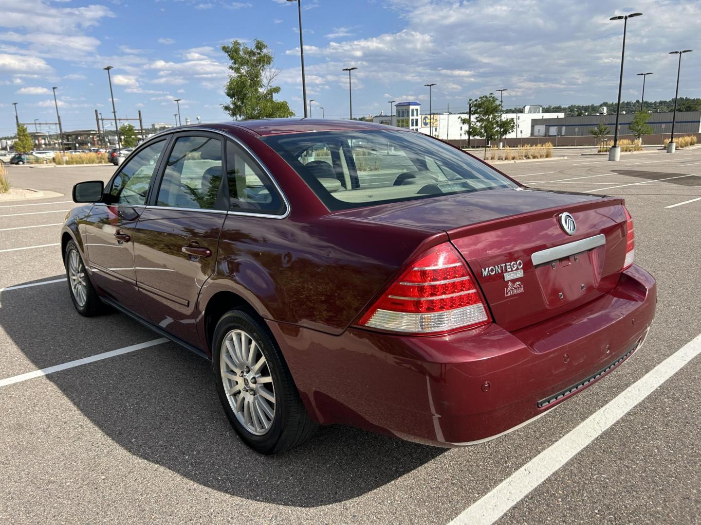 2005 Mercury Montego Premier (1MEFM421X5G) with an 3.0L V6 DOHC 24V engine, 6-Speed Automatic Overdrive transmission, located at 5972 Sheridan Blvd., Arvada, CO, 80003, (303) 422-4988, 39.805470, -105.053001 - Runs and drives great Leather seats Back up sensors Good tires Sunroof AC and heat work great Clean car Just got detailed Clean title Has hail damage - Photo#1