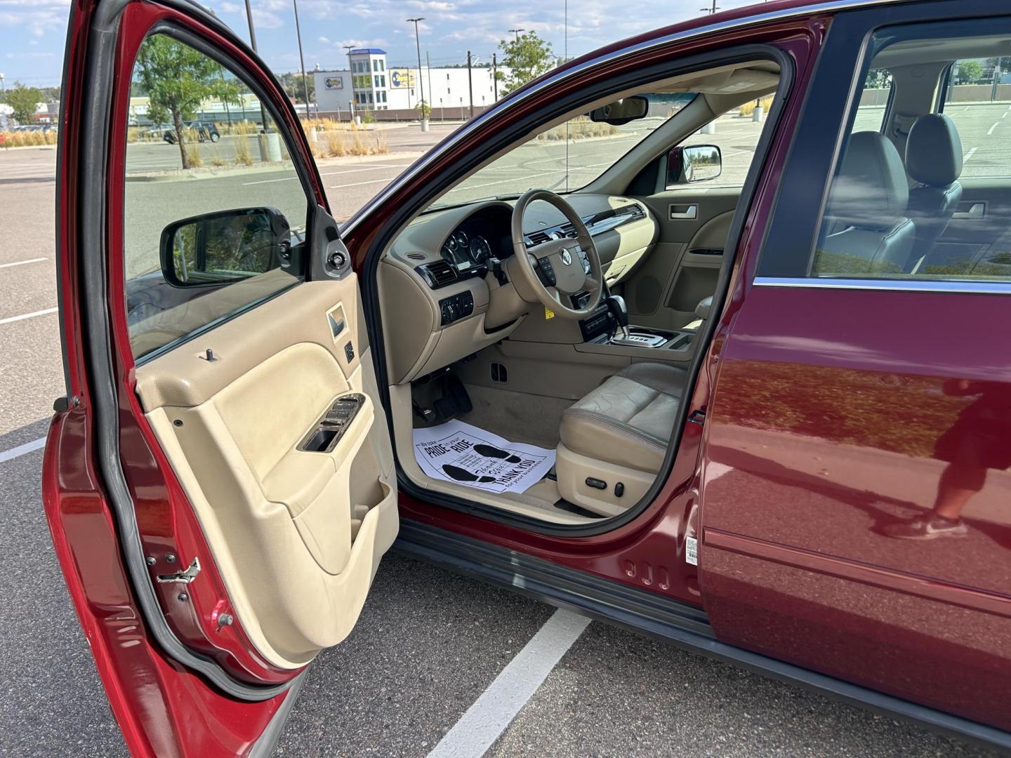 2005 Mercury Montego Premier (1MEFM421X5G) with an 3.0L V6 DOHC 24V engine, 6-Speed Automatic Overdrive transmission, located at 5972 Sheridan Blvd., Arvada, CO, 80003, (303) 422-4988, 39.805470, -105.053001 - Runs and drives great Leather seats Back up sensors Good tires Sunroof AC and heat work great Clean car Just got detailed Clean title Has hail damage - Photo#10