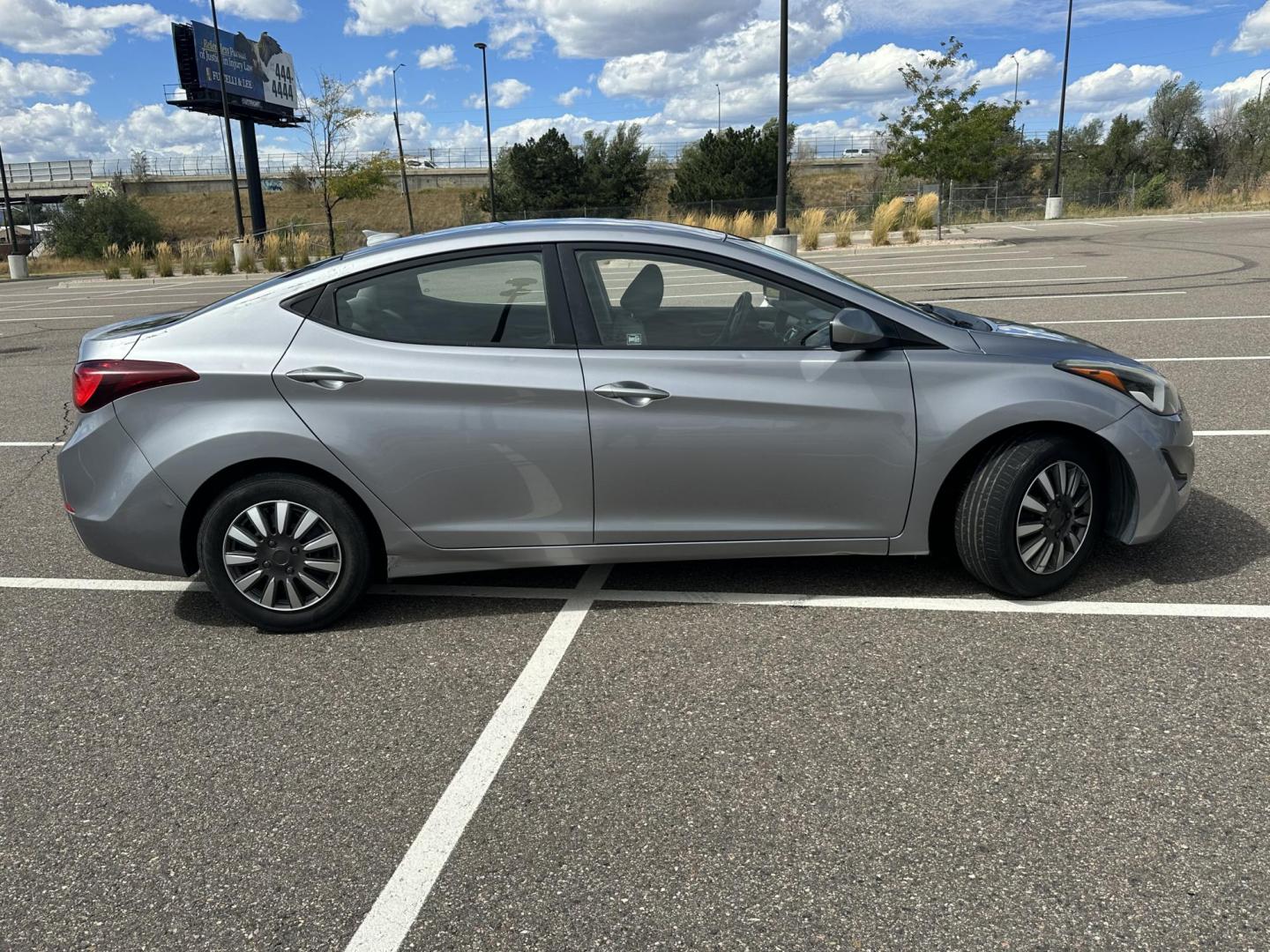 2016 Hyundai Elantra Limited (5NPDH4AE8GH) with an 1.8L L4 DOHC 16V engine, 6-Speed Automatic transmission, located at 5972 Sheridan Blvd., Arvada, CO, 80003, (303) 422-4988, 39.805470, -105.053001 - This car runs and drives great and is in very good condition. Aside from hail damage the vehicle is in tip top shape. Vehicle is front wheel drive and has working heater and A/C. - Photo#5