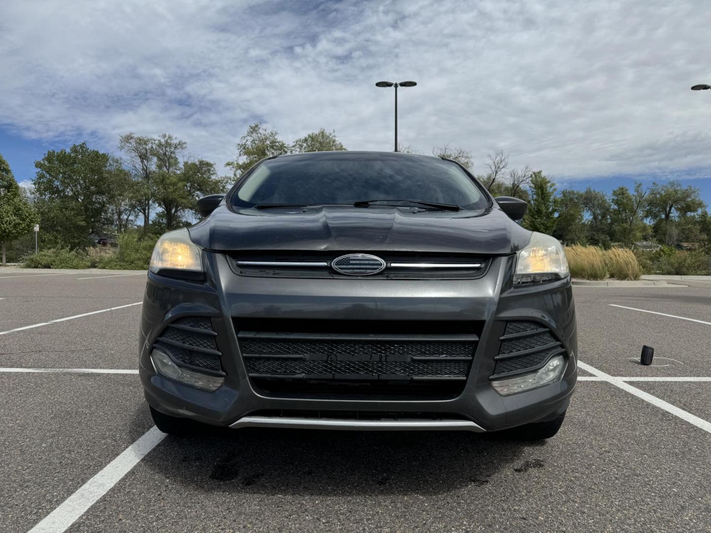 2015 Ford Escape SE 4WD (1FMCU9GX6FU) with an 1.6L L4 DOHC 16V engine, 6-Speed Automatic transmission, located at 5972 Sheridan Blvd., Arvada, CO, 80003, (303) 422-4988, 39.805470, -105.053001 - Car runs and drives perfectly fine and is in great condition. Car is all wheel drive and has a great set of tires on it. Heater and A/C work fine. - Photo#0